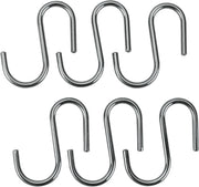 Eleganti ganci cromati per barra cucina: organizzazione e stile in un unico accessorio.