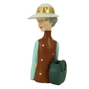 Donna resina marrone con borsa portavaso cm17x13h36