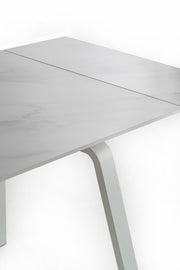 Tavolo allungabile con top in pietra effetto marmo bianco 140/200x80x76h cm