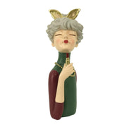 Donna resina con rossetto verde cm16,5x12h32